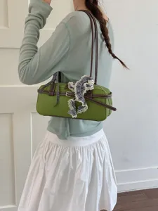 Green Boston shoulder bag for women, stylish contrast color handbag with lace ribbon bow.