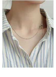 Delicato girocollo regolabile in argento S925 con perle scintillanti che mostra raffinata maestria.