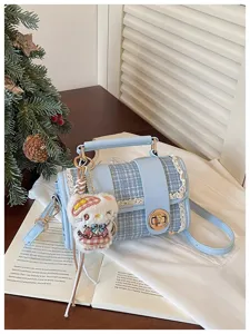 Blue plaid boston shoulder bag stylish contrasting color top handle bag with cute charm.