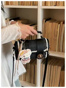 Fashion black plaid boston shoulder bag for women, chic lace trim crossbody handbag with cute plush charm.