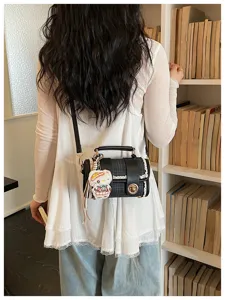 Black and white plaid small shoulder bag with top handle and cute charm for women
