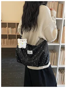 Borsa shopper in tela con stampa di stelle nere borsa a tracolla casual con ciondolo peluche.