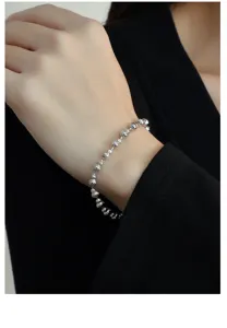 S925 Sterling Silber Kuerbis Perlen Armband fuer Damen und Herren, elegantes Schmuckstueck.