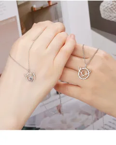 Detailed close-up of S925 silver deer antler couple necklaces, elegant design for daily wear.