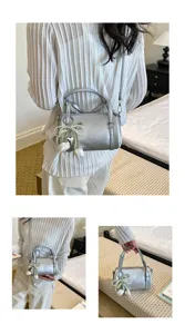 Stylish silver pillow shoulder bag with tulip charm, trendy Korean style crossbody bag for women.