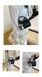 Black cylinder shoulder bag for women stylish crossbody bag with pearl tulip pendant chic