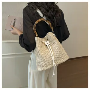 Sac seau en paille d'été avec poignée en bambou, sac bandoulière de plage décontracté.
