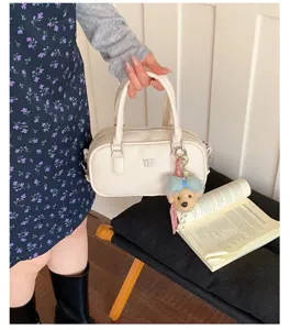Women fashion PU leather bowling shoulder bag commuter handbag with cute bear pendant 2026