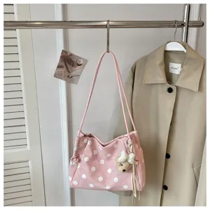 Pink polka dot canvas shoulder bag for women, large capacity commuter tote bag with bear charm.