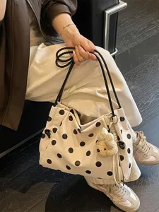 Stylish polka dot canvas tote bag for women, large capacity casual shoulder bag daily commute.