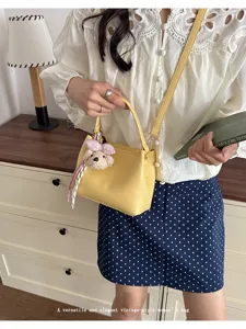 Stylish yellow bucket bag for women, versatile PU leather shoulder and crossbody bag for daily.