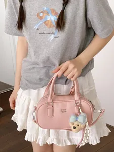 Fashion pink bowling shoulder bag women casual PU leather crossbody handbag with cute charm