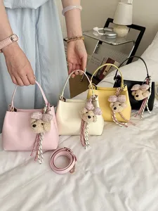 Women bucket bag PU leather shoulder crossbody bag with cute teddy bear plush charm set