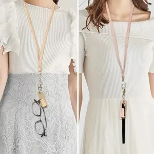 Versatile leather lanyard for pens and glasses, portable keychain strap holder for daily use.