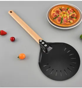 Stainless steel pizza peel with wooden handle, perforated design for easy baking transfer.