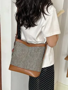 Stylish summer women bucket bag, large capacity cross-body shoulder bag for daily commuting wear.