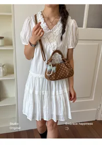 Sweet polka dot crossbody shoulder bag for women, stylish summer handbag with pearl bow.