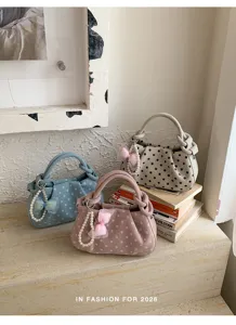 Chic sweet polka dot handbag with pearl chain and bow, stylish shoulder bag for women.