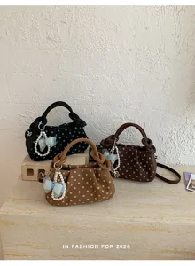 Sweet polka dot handbag for women, trendy summer crossbody and shoulder bag with pearl bow decor.