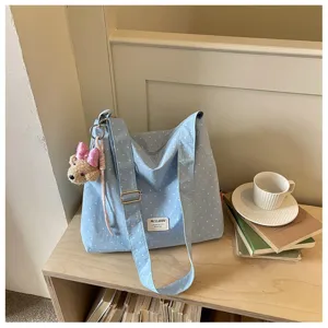 Sac cabas en toile à pois bleu clair sac à bandoulière décontracté pour les trajets quotidiens.