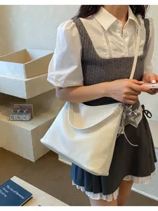 Minimalist white leather shoulder tote bag for women, chic commuter messenger bag with star charm.