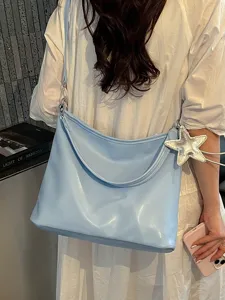 Light blue shoulder tote bag for women, casual PU leather hobo bag with star charm for daily use.