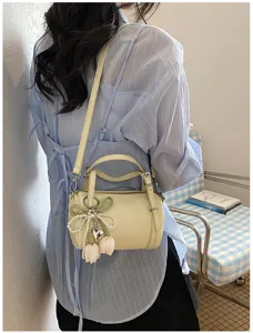 Minimalist women pillow shoulder bag with charming tulip pearl pendant detail fashion accessory