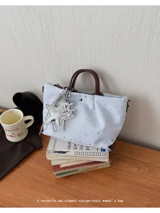 Stylish women tote bag vintage star pattern large capacity shoulder handbag for daily use.