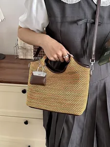 Summer woven bucket bag for women, casual single shoulder crossbody handbag with brown leather trim.