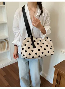 Chic polka dot canvas shoulder bag for women, casual daily crossbody bag with black strap.