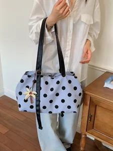 Stylish polka dot shoulder bag for women, casual daily tote with chic palm tree charm.