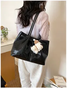 Black woven leather tote bag, large capacity shoulder bag, minimalist casual handbag.