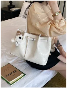 Elegant white woven tote bag for women, large capacity daily shoulder bag for commute.
