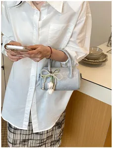 Stylish small grey pillow bag with elegant pearl tulip pendant for women daily commute chic