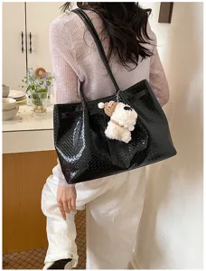 Black woven tote bag for women, large capacity shoulder bag with cute puppy charm.