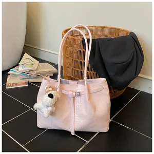Chic pink woven tote bag for women, large capacity shoulder bag with cute puppy charm and belt.