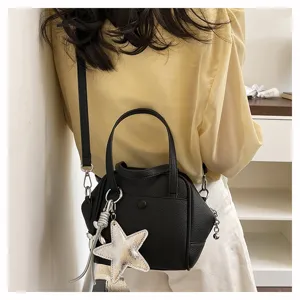 Black leather shoulder bag with star charm stylish casual crossbody bag for women daily use.
