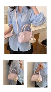 Pink stylish women shoulder crossbody bag with cute plush bear pendant daily casual handbag.