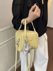 Stylish yellow PU leather top handle handbag with silver star charm for women casual daily wear