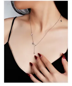 Elegante S925 Silber Schmetterling Halskette mit funkelndem Zirkon Quastenanhänger für Damen.