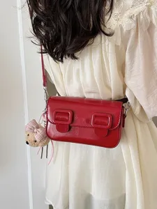 Stylish red patent leather small shoulder bag for women, trendy niche design crossbody handbag.