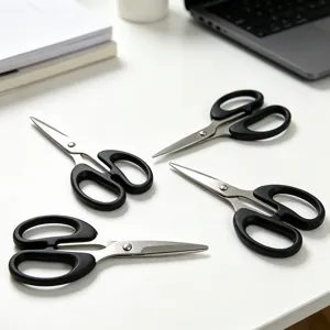Stainless steel office scissors set with ergonomic black handles for precise paper cutting.