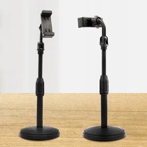 Black round base mobile phone live streaming stand with adjustable height and rotating holder.