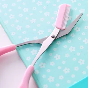 Pink eyebrow trimming scissors with built in comb makeup tool for daily beauty care