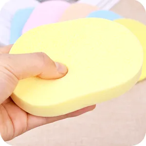 Soft facial cleansing sponge for makeup removal and deep skin care, gentle and absorbent.