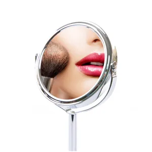 Metal desktop makeup mirror, double-sided rotatable cosmetic vanity mirror with stand.