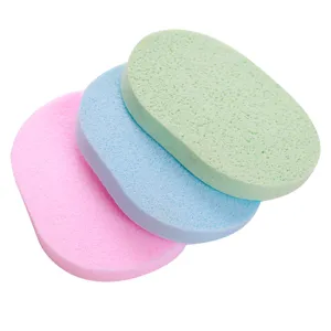 Set of three colorful oval facial cleansing sponges for deep cleaning, soft makeup removal tool.