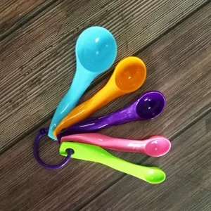 Colorful plastic measuring spoons 5 piece set for baking coffee cooking kitchen tools detail