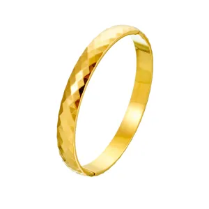 Geometric cut titanium steel gold-plated bangle bracelet, elegant sparkling minimalist cuff.