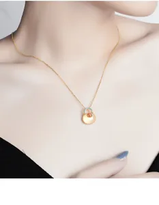 Detailed shot of S925 sterling silver Hetian jade fortune bag pendant necklace vintage style.